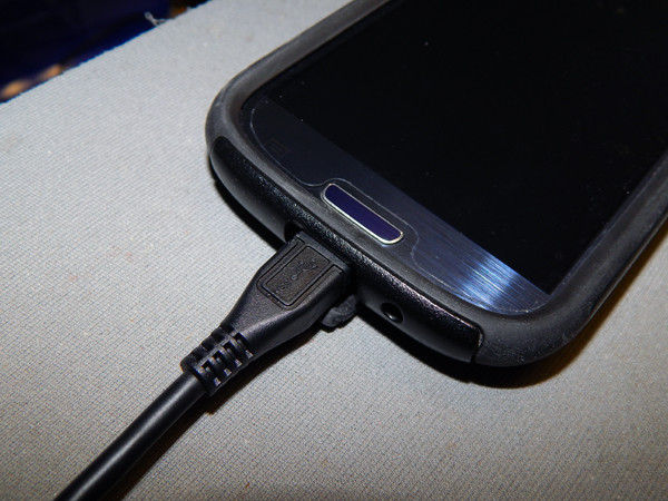 Micro USB extension plugged into S3 with Otterbox case